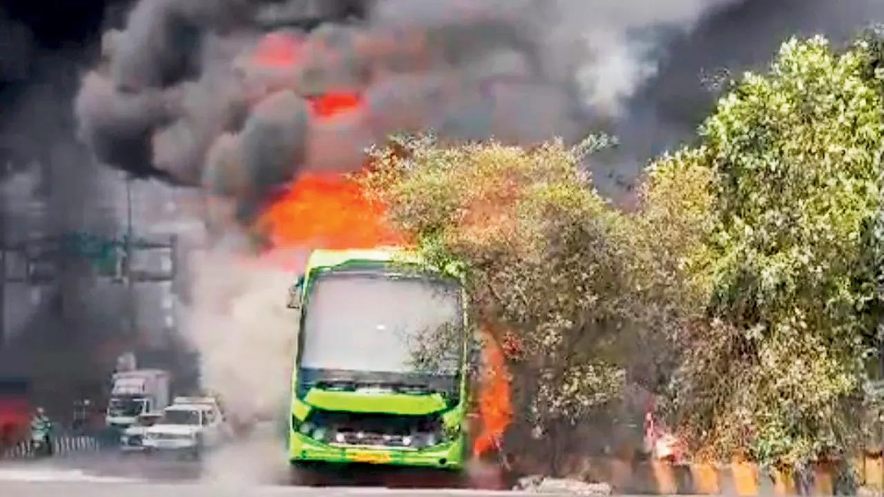 Seconds from disaster, 20 passengers escape blazing luxury bus near Vashi bridge Fire that broke out on a luxury bus in Navi Mumbai. Pics/PTI