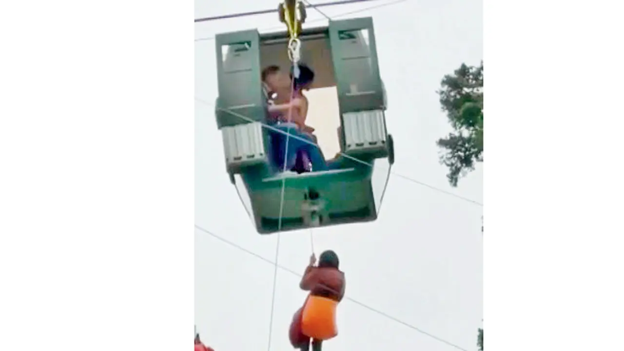 Tourists stranded on Gulmarg Gondola after cable car malfunction in Jammu and Kashmir The cable car in J&K’s Gulmarg developed a technical snag on Monday. PIC/X/@PTI_News