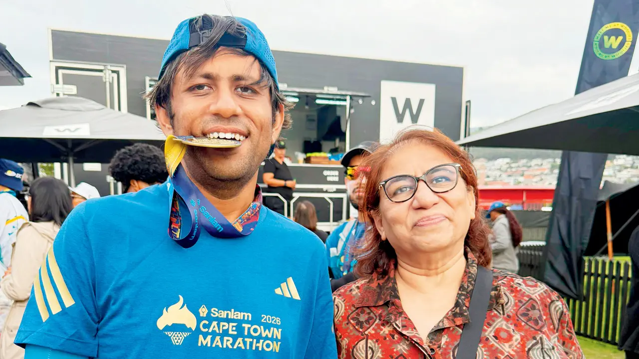 Mumbai runner Mitaram Jangid completes Cape Town Marathon at 50, inspiring many Prithvi Ghag with his mother. PICS/BY SPECIAL ARRANGEMENT