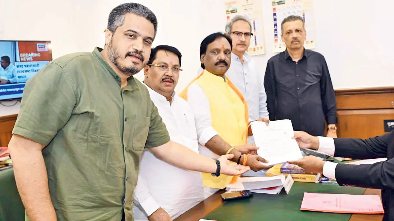 Shiv Sena (UBT) nominee Ambadas Danve (third from right) files his nominations as Maha Vikas Aghadi’s candidate for the MLC polls. Pic/X/@NarvekarMilind_