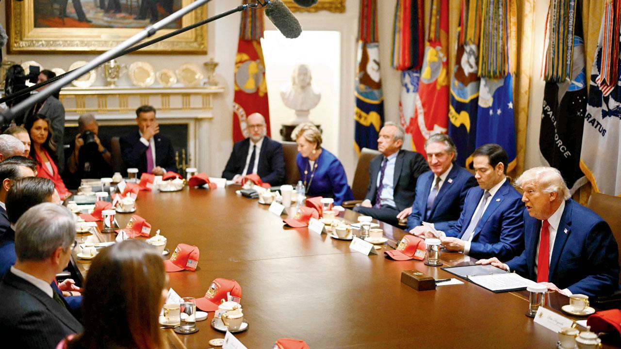 US President Donald Trump (right) speaks during a cabinet meeting in the Cabinet Room of the White House in Washington, on Wednesday. Pic/AFP
