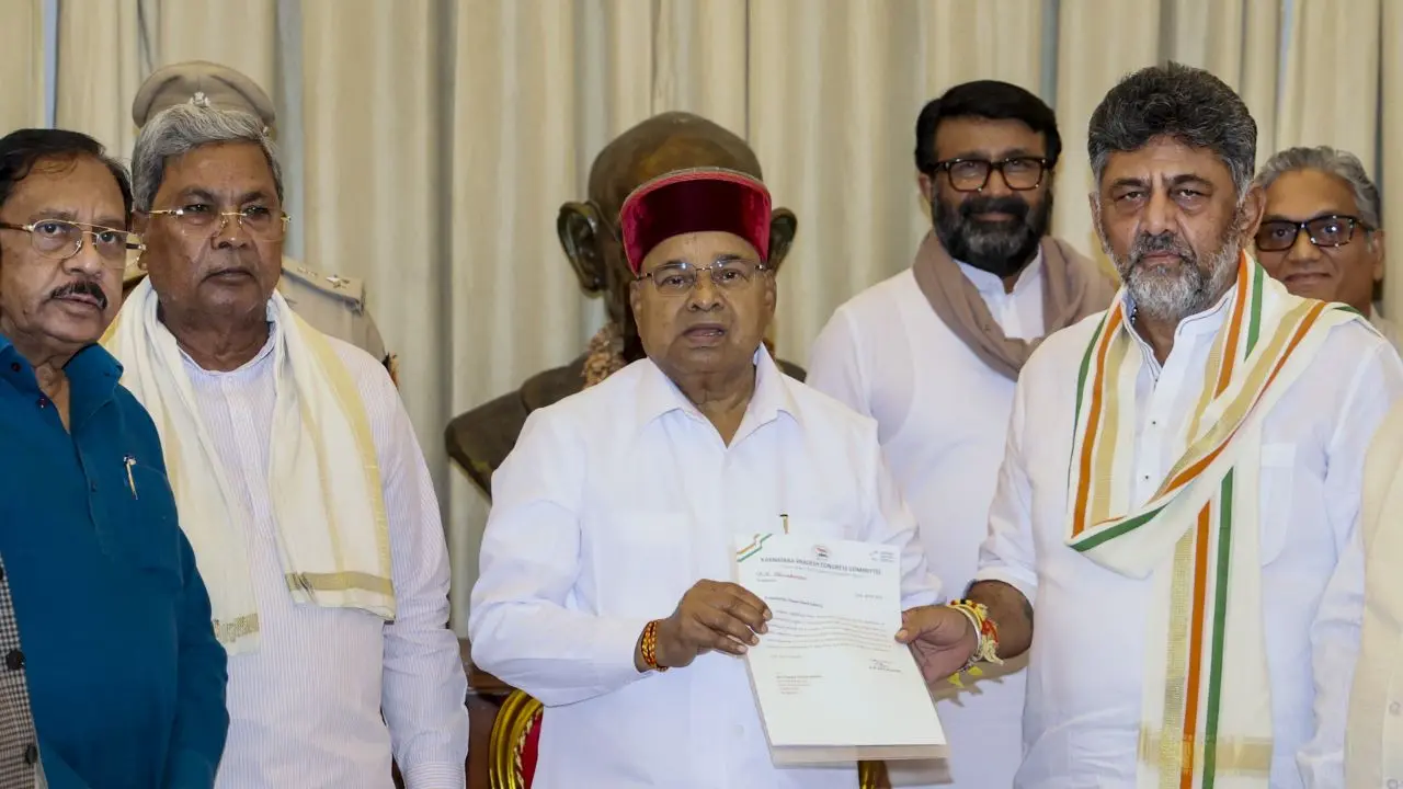 Suspense over Karnataka government formation ends, DK Shivakumar to take oath as CM on June 3 Karnataka Governor Thaawarchand Gehlot receives a letter from Congress President DK Shivakumar, as the latter stakes claim to form a new government after he was elected leader of the legislature party, in Bengaluru. PIC/PTI