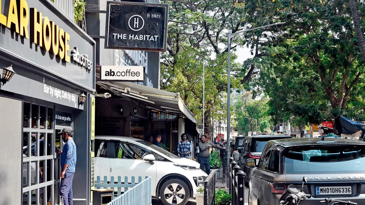 An illegally parked car on the footpath. PICS/SATEJ SHINDE