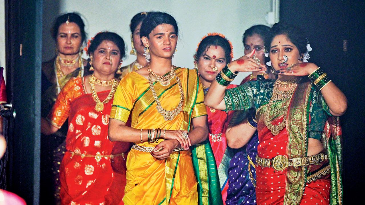 Adding a distinctive touch, three young men participate in the event, performing Lavani in traditional nauvari sarees and breaking conventional expectations Adding a distinctive touch, three young men participate in the event, performing Lavani in traditional nauvari sarees and breaking conventional expectations