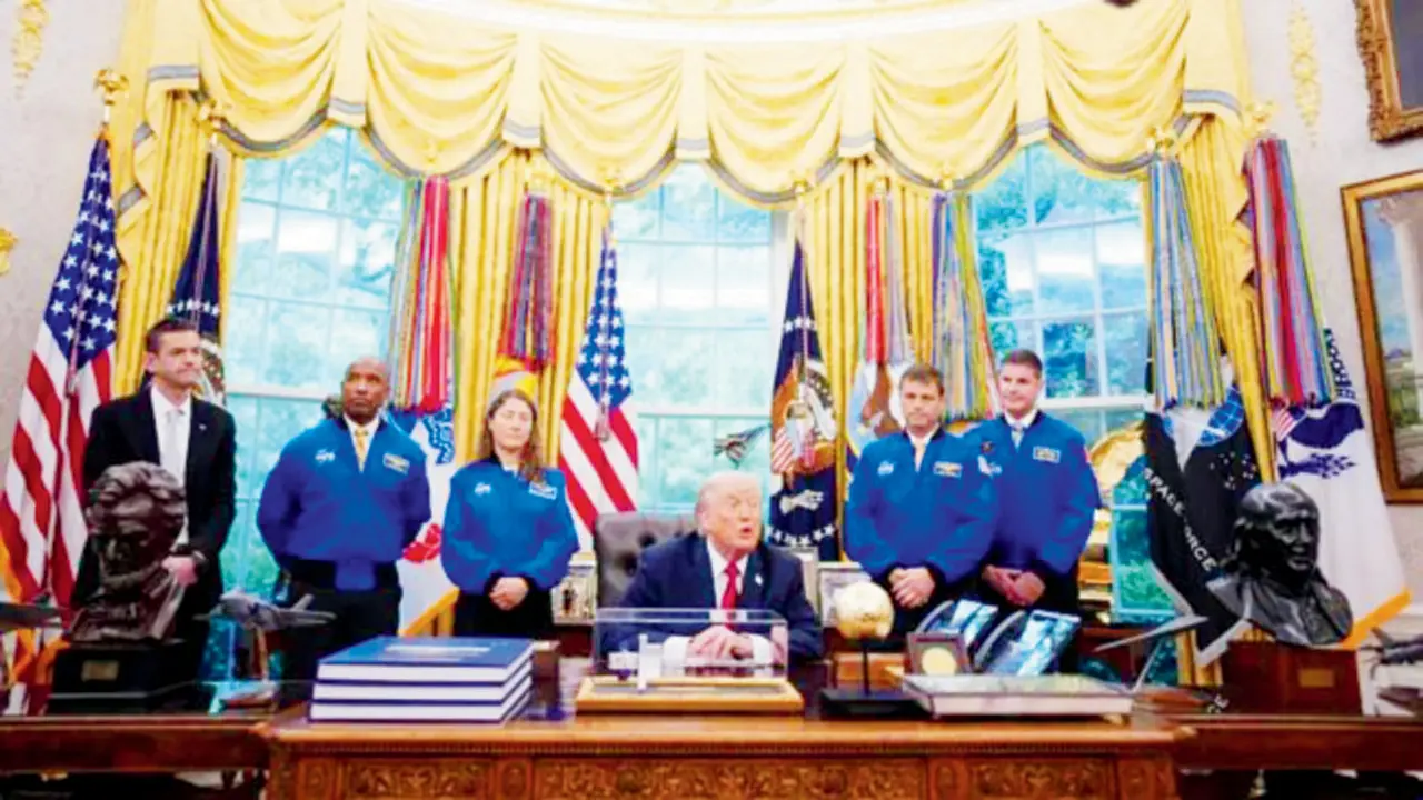 President Donald Trump (centre) with Artemis 2 astronauts (in blue flight suits) and NASA Administrator Jared Isaacman (extreme left) to the Oval Office on Wednesday. PIC COURTESY/The White House