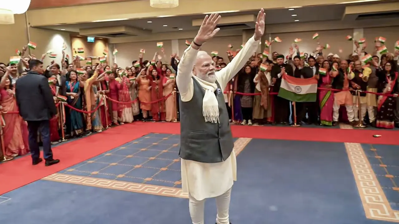 PM Narendra Modi greets the Indian community following his arrival in Oslo on Monday. PIC/PTI PM Narendra Modi greets the Indian community following his arrival in Oslo on Monday. PIC/PTI