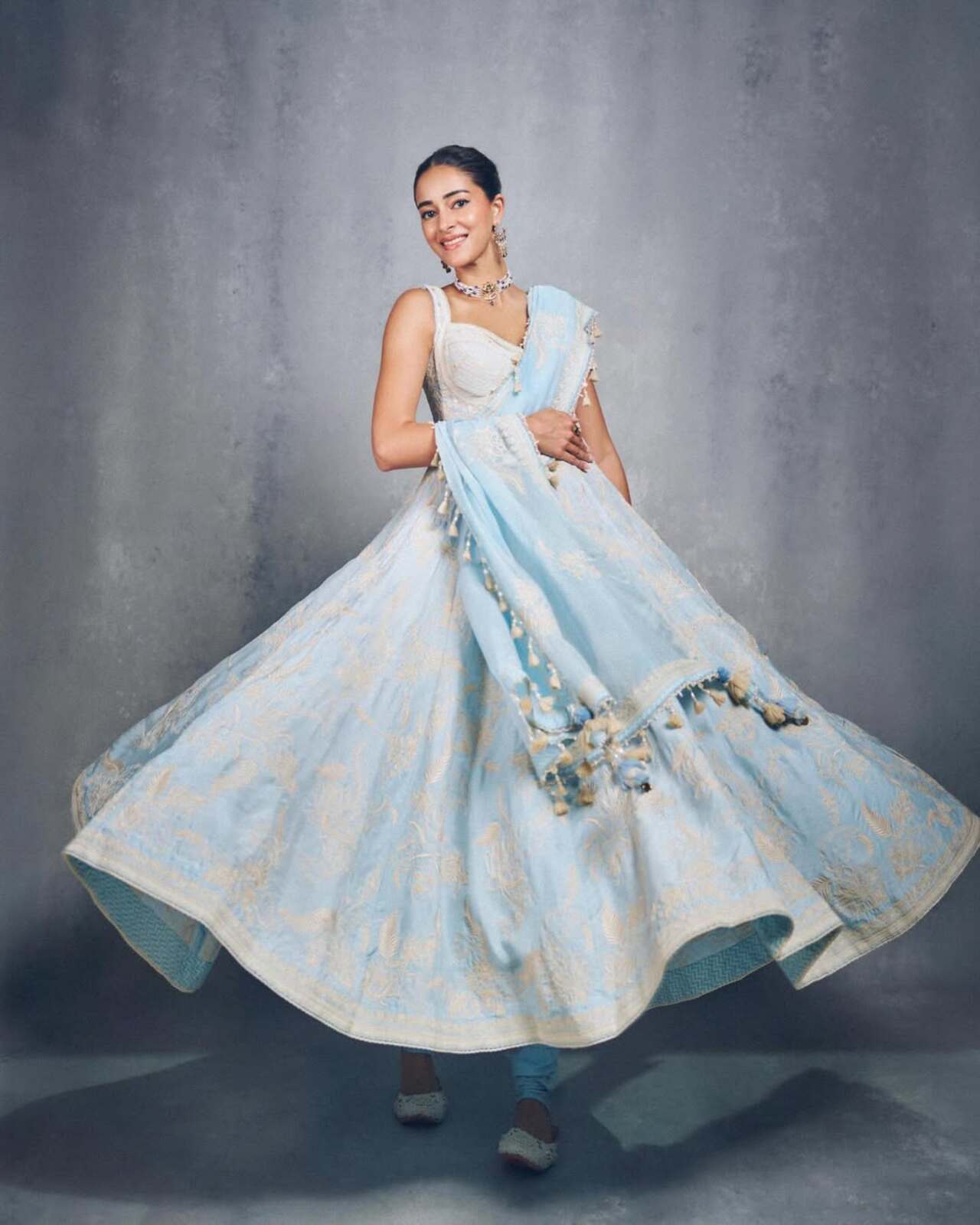For the promotions of her romantic drama Chand Mera Dil, Ananya Panday stepped out in an ethereal pastel-blue Anarkali. For the promotions of her romantic drama Chand Mera Dil, Ananya Panday stepped out in an ethereal pastel-blue Anarkali.