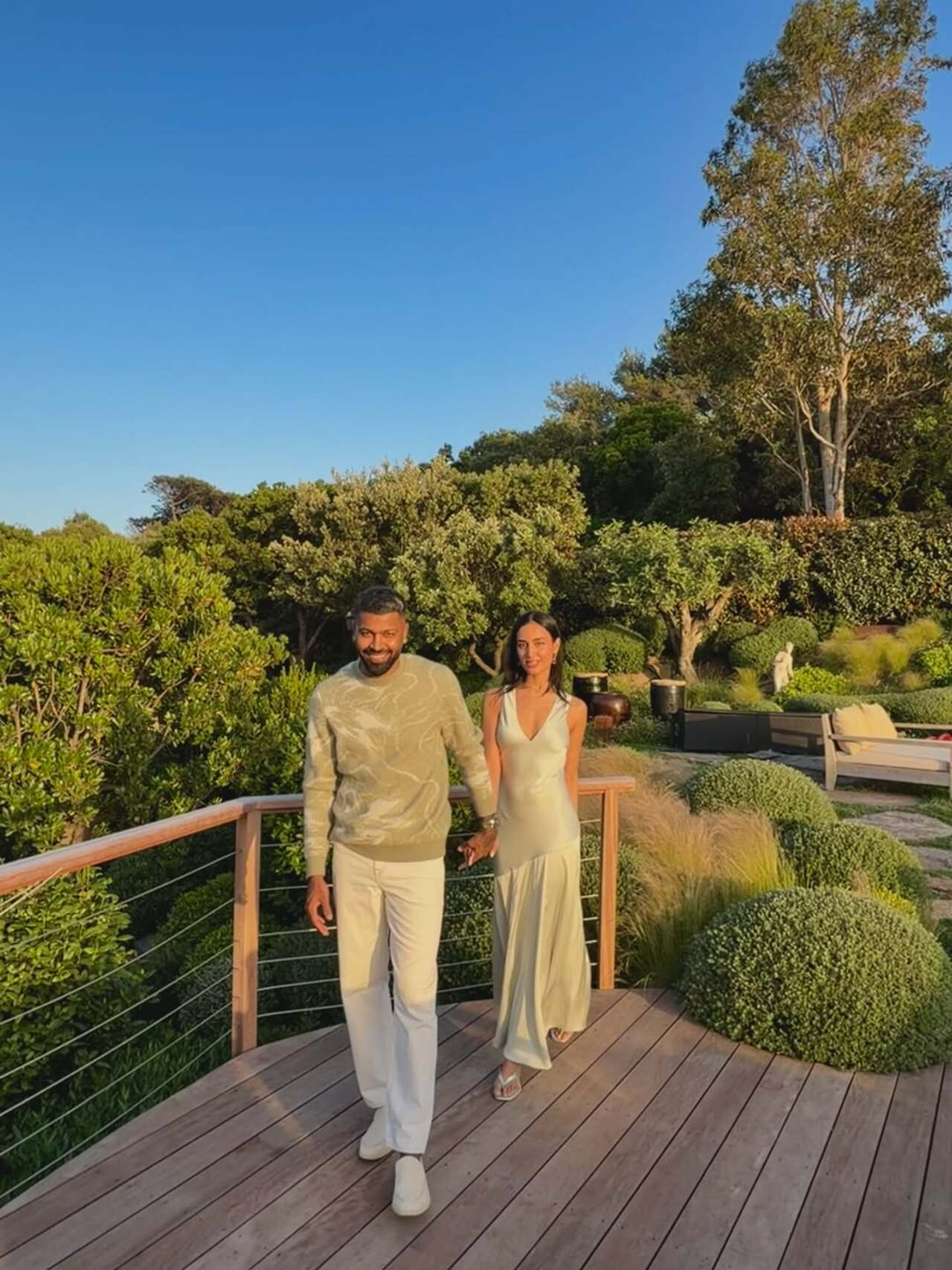 Hardik Pandya and Mahieka Sharma look every bit the stylish power couple as they pose hand-in-hand amid the scenic beauty of Saint-Tropez. Hardik Pandya and Mahieka Sharma look every bit the stylish power couple as they pose hand-in-hand amid the scenic beauty of Saint-Tropez.