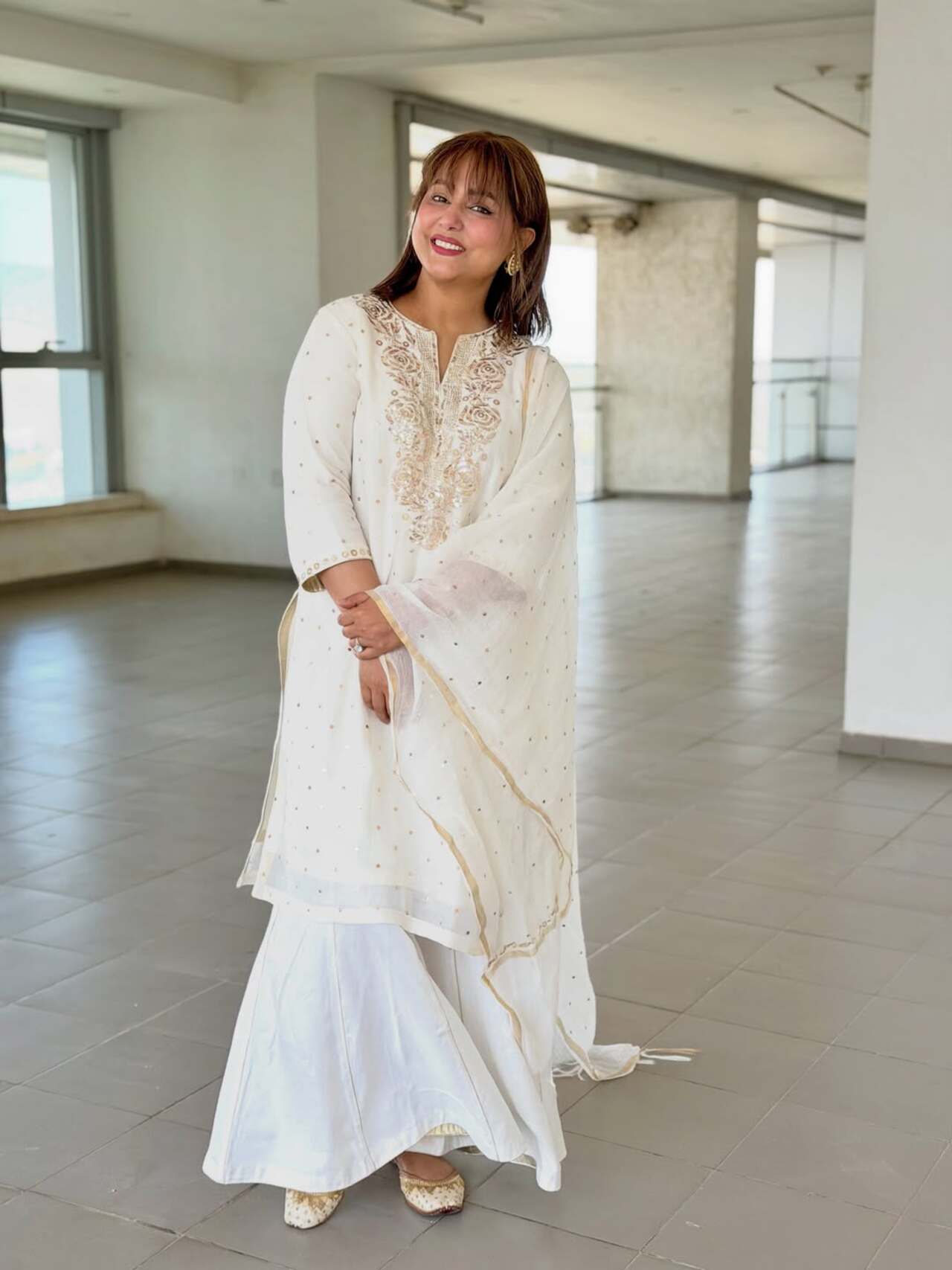 Hina completed the look with subtle heels, exuding timeless festive charm and sophistication. Hina completed the look with subtle heels, exuding timeless festive charm and sophistication.