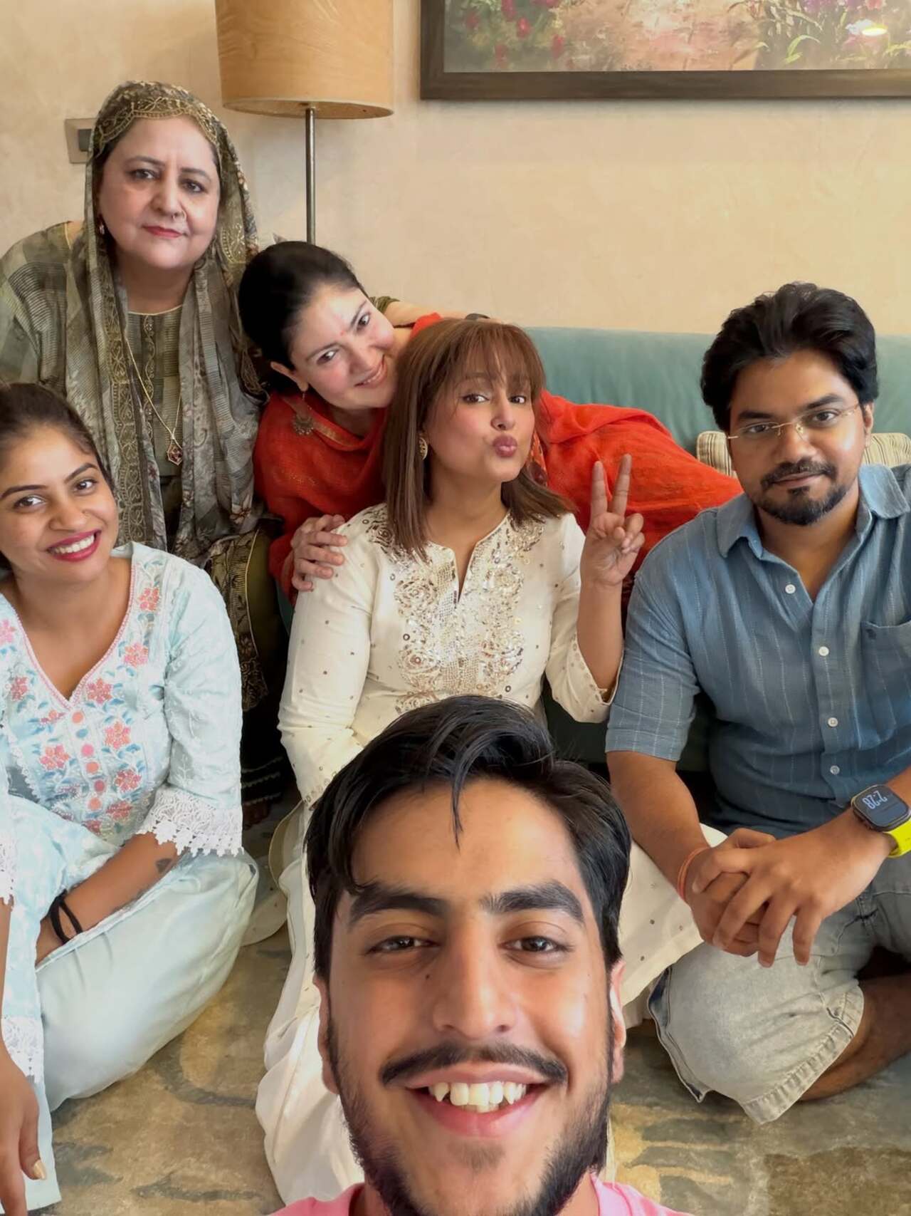 The cosy gathering, vibrant ethnic outfits and happy smiles reflected the festive spirit and close bond shared by the family. The cosy gathering, vibrant ethnic outfits and happy smiles reflected the festive spirit and close bond shared by the family.