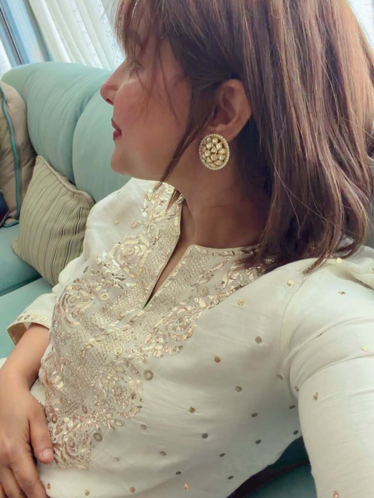 Keeping her look elegant and minimal, the actress styled her outfit with statement earrings and soft makeup. Keeping her look elegant and minimal, the actress styled her outfit with statement earrings and soft makeup.