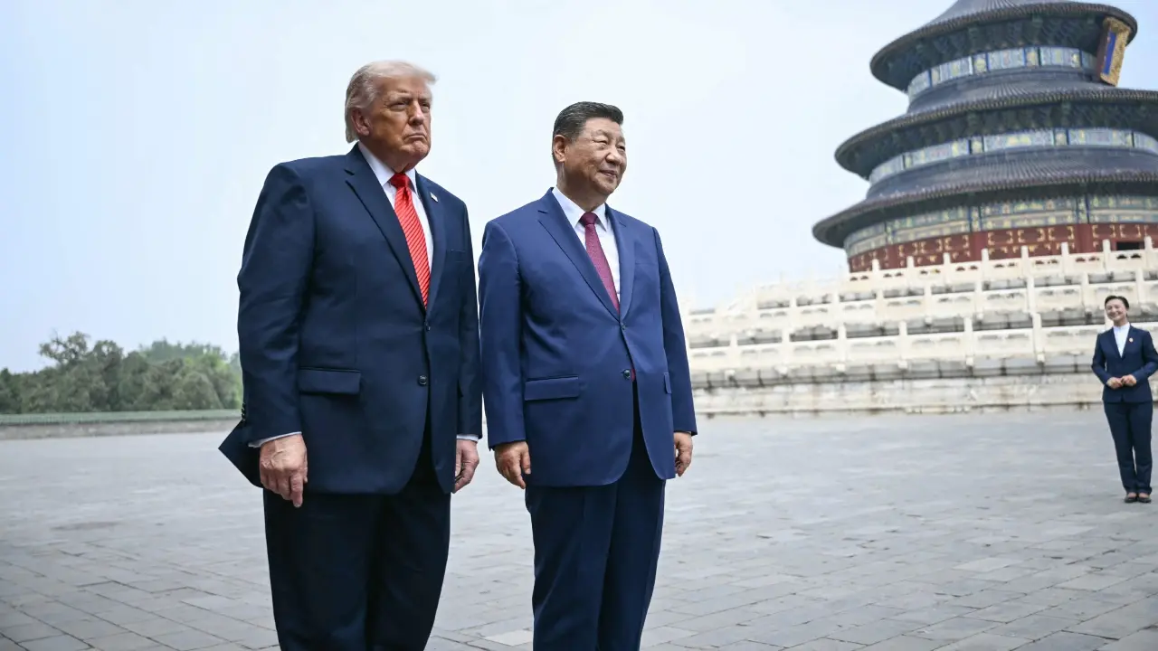Both leaders shared a warm handshake before Trump met members of Xi's cabinet. Both leaders shared a warm handshake before Trump met members of Xi's cabinet.