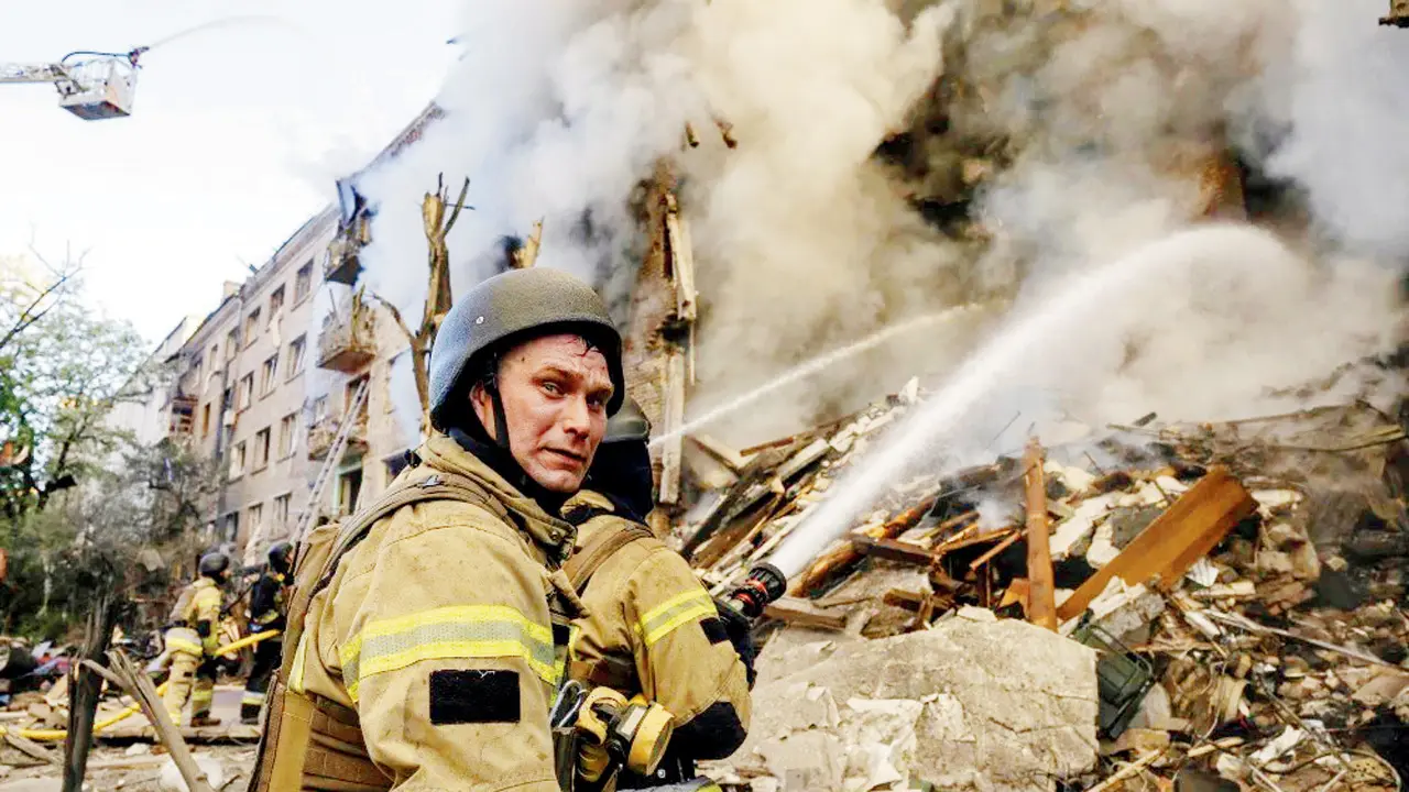 Russia claims capture of two more villages in Ukraine’s northeastern Kharkiv and Zaporizhzhia regions Ukrainian firefighters work at the site of a heavily damaged building following Russian strikes on Kyiv. PIC/AFP