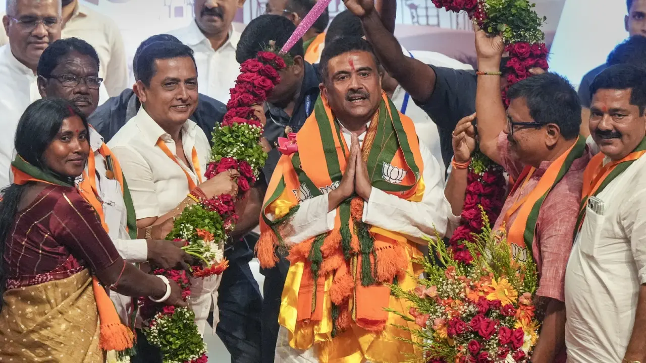 Adhikari was unanimously elected leader of the BJP legislature party, Union Home Minister Amit Shah announced on Friday. Pics/PTI