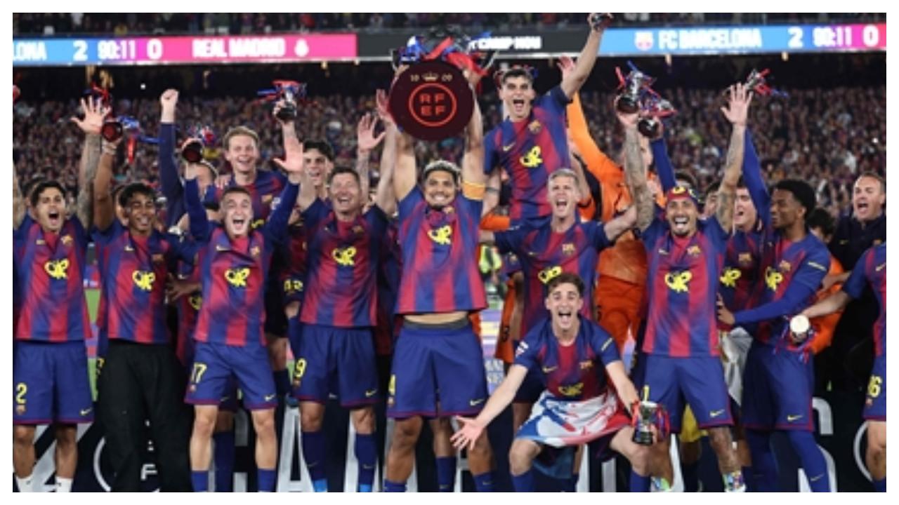 Barcelona players celebrate winning the league (Pic: AFP)
