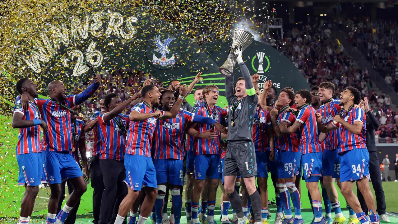 Crystal Palace beat Rayo 1-0 to win Conference League Crystal Palace's English goalkeeper Dean Henderson (C-R) raises the trophy as his team celebrates after winning the UEFA Conference League final football match between Crystal Palace FC and Rayo Vallecano de Madrid in Leipzig, eastern Germany. Pic/AFP