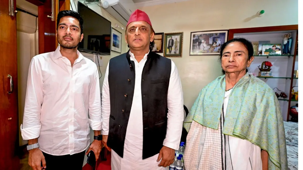 Outgoing West Bengal Chief Minister, TMC supremo Mamata Banerjee and Abhishek Banerjee. (Pic/PTI)