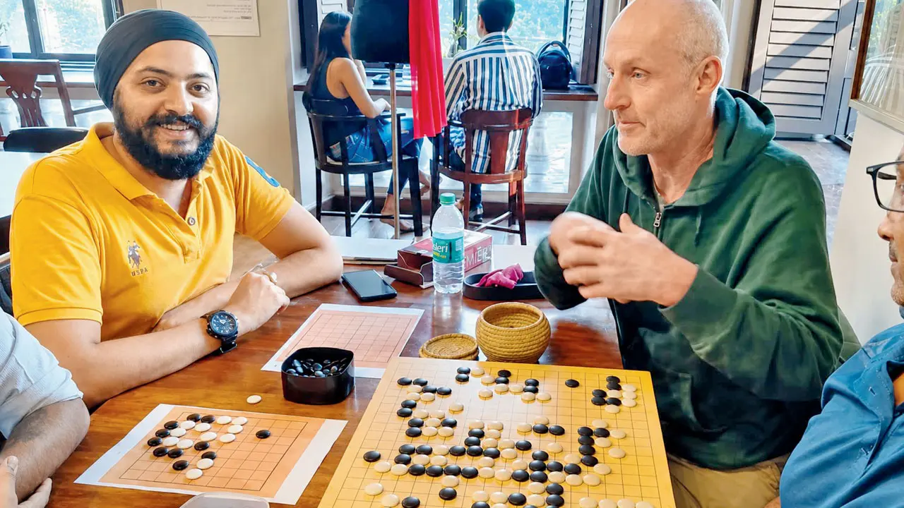 Participants play a round of Go. The two-player game is almost 4500 years old. pics courtesy/association of Indian Go players 
