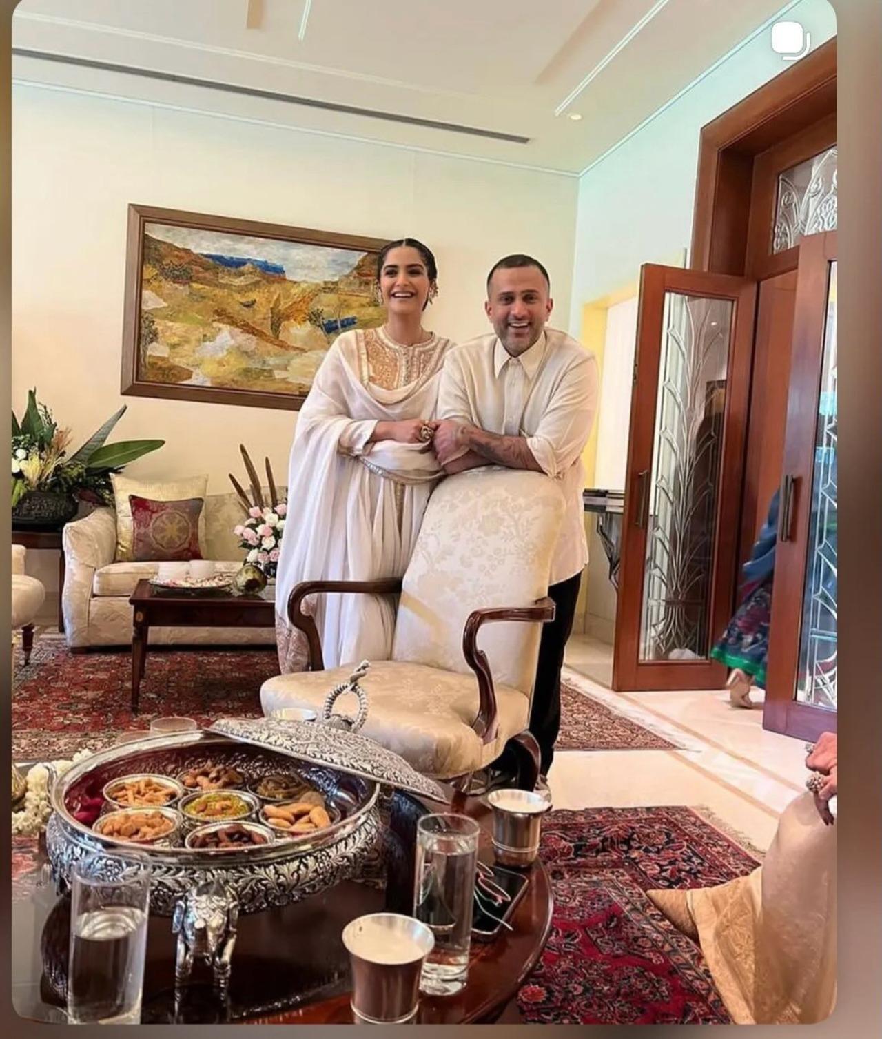 The post also included a candid picture of the couple from thier home during what appears to be a festival. Both are seen in white, with Sonam looking radiant in a white anarkali with golden work, while Anand dons a simple white shirt. The post also included a candid picture of the couple from thier home during what appears to be a festival. Both are seen in white, with Sonam looking radiant in a white anarkali with golden work, while Anand dons a simple white shirt.
