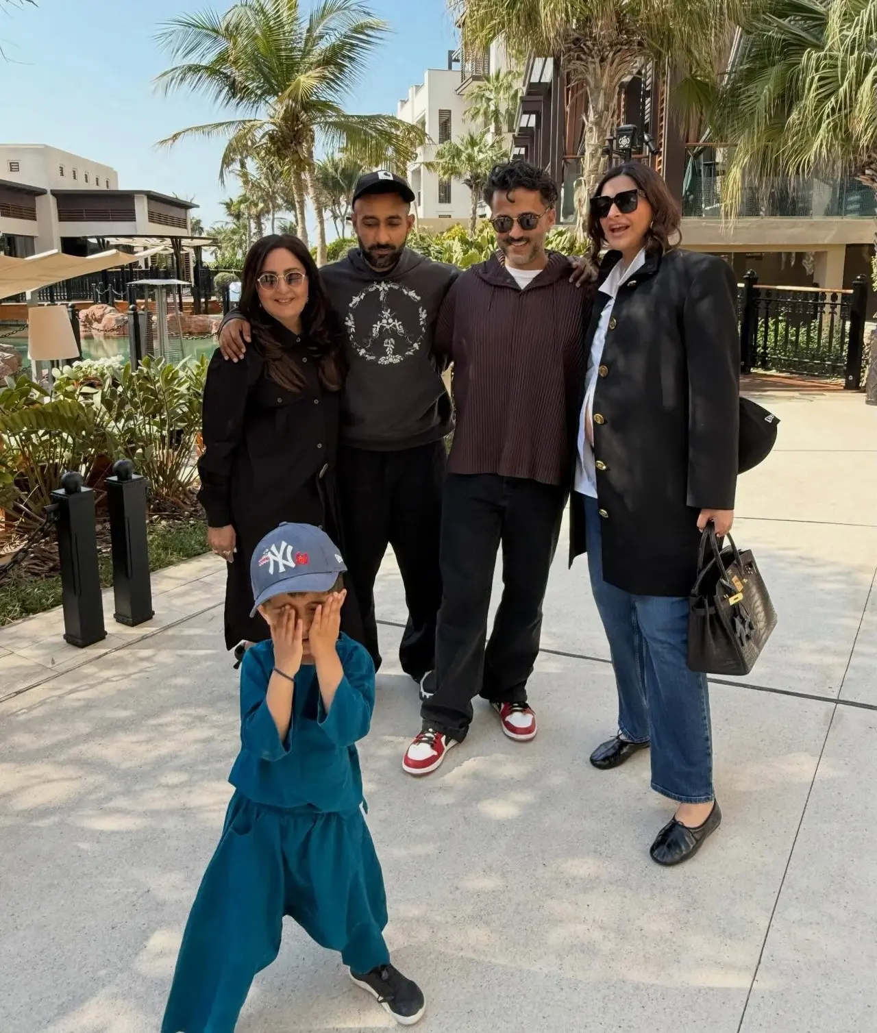 Priya also shared a picture of their family from a vacation, where Vayu is seen playfully posing. Priya also shared a picture of their family from a vacation, where Vayu is seen playfully posing.