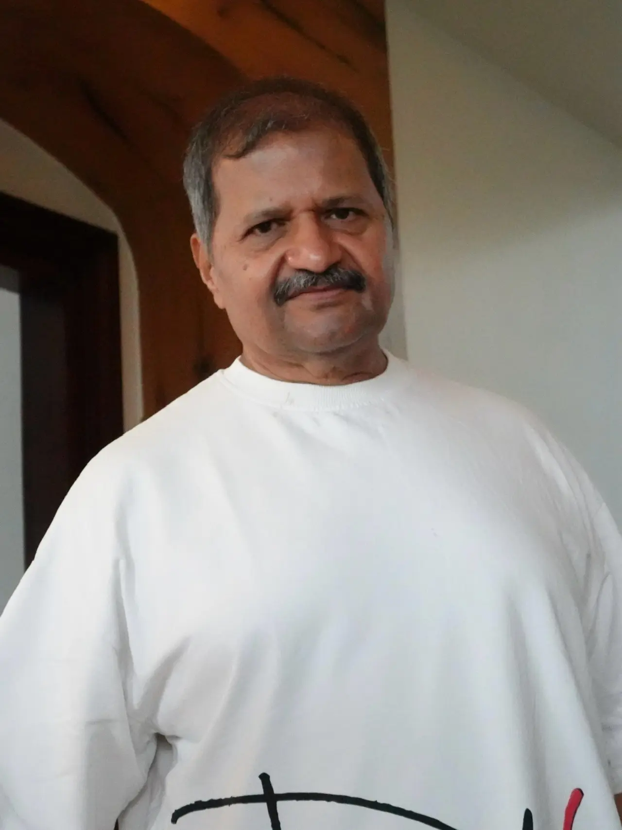 The photo dump also included a picture of Vijay's father, smiling at the camera in a white t-shirt. The photo dump also included a picture of Vijay's father, smiling at the camera in a white t-shirt.