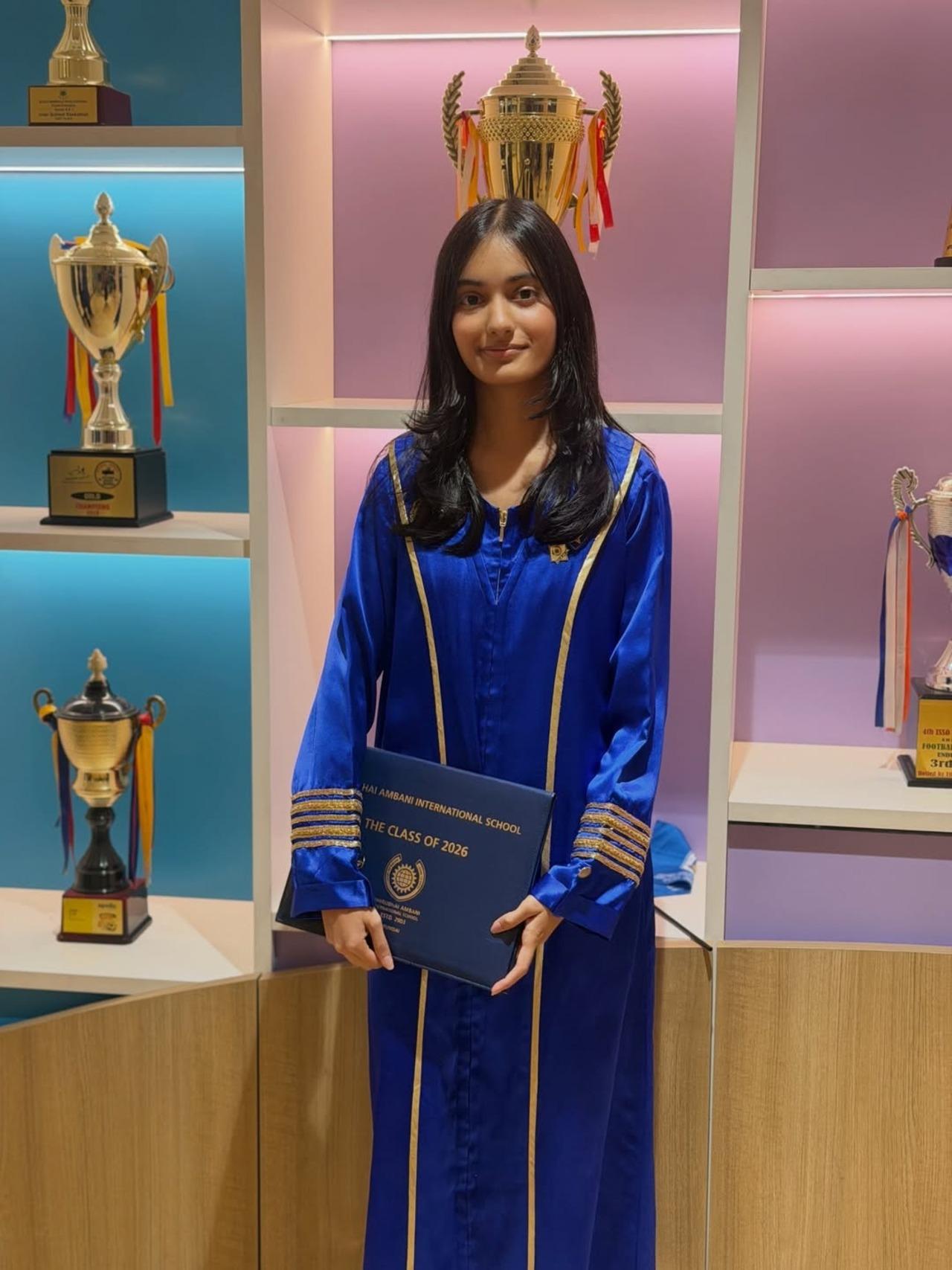 Farah shared a picture of daughter, Diva Kunder, posing with her graduation certificate against a shelf of her trophies. Farah shared a picture of daughter, Diva Kunder, posing with her graduation certificate against a shelf of her trophies.