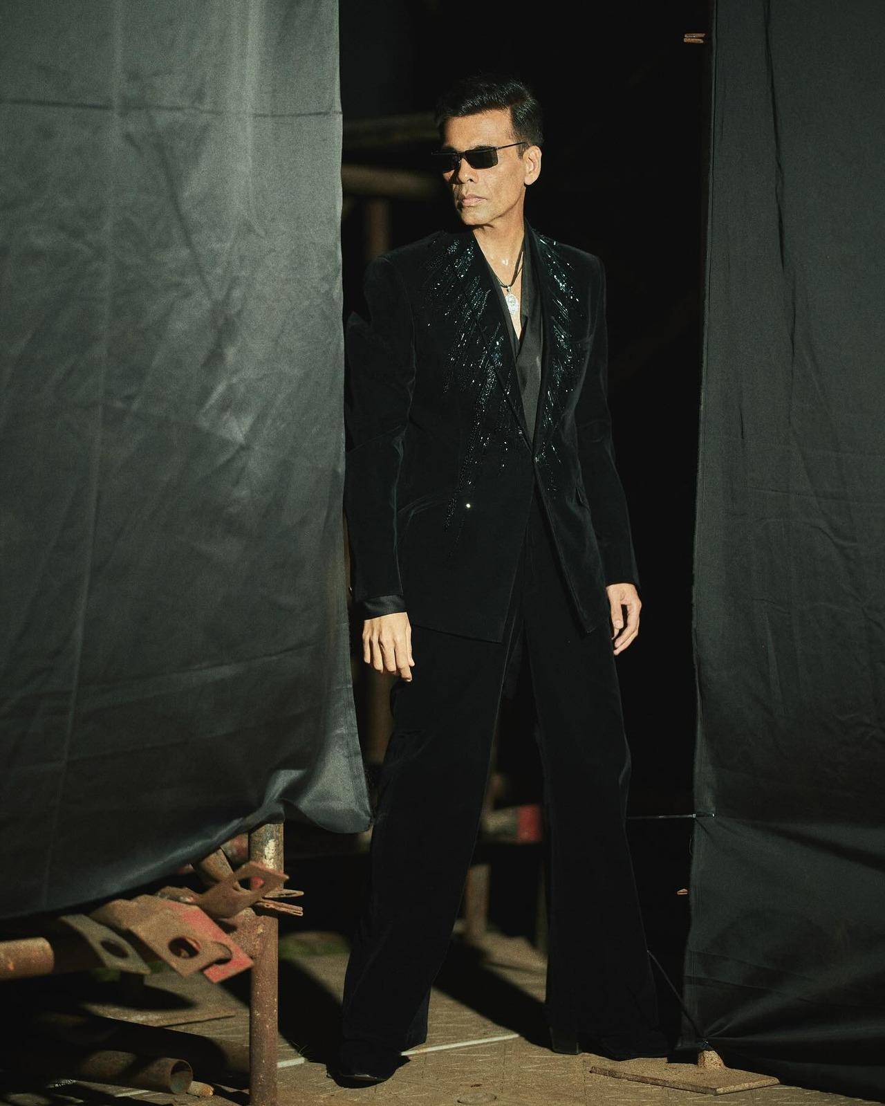 Karan always has ways to take a classic tuxedo from meh to wow. This custom-made black velvet tuxedo designed, featuring intricate crystal embellishments on the lapels, is just one example.