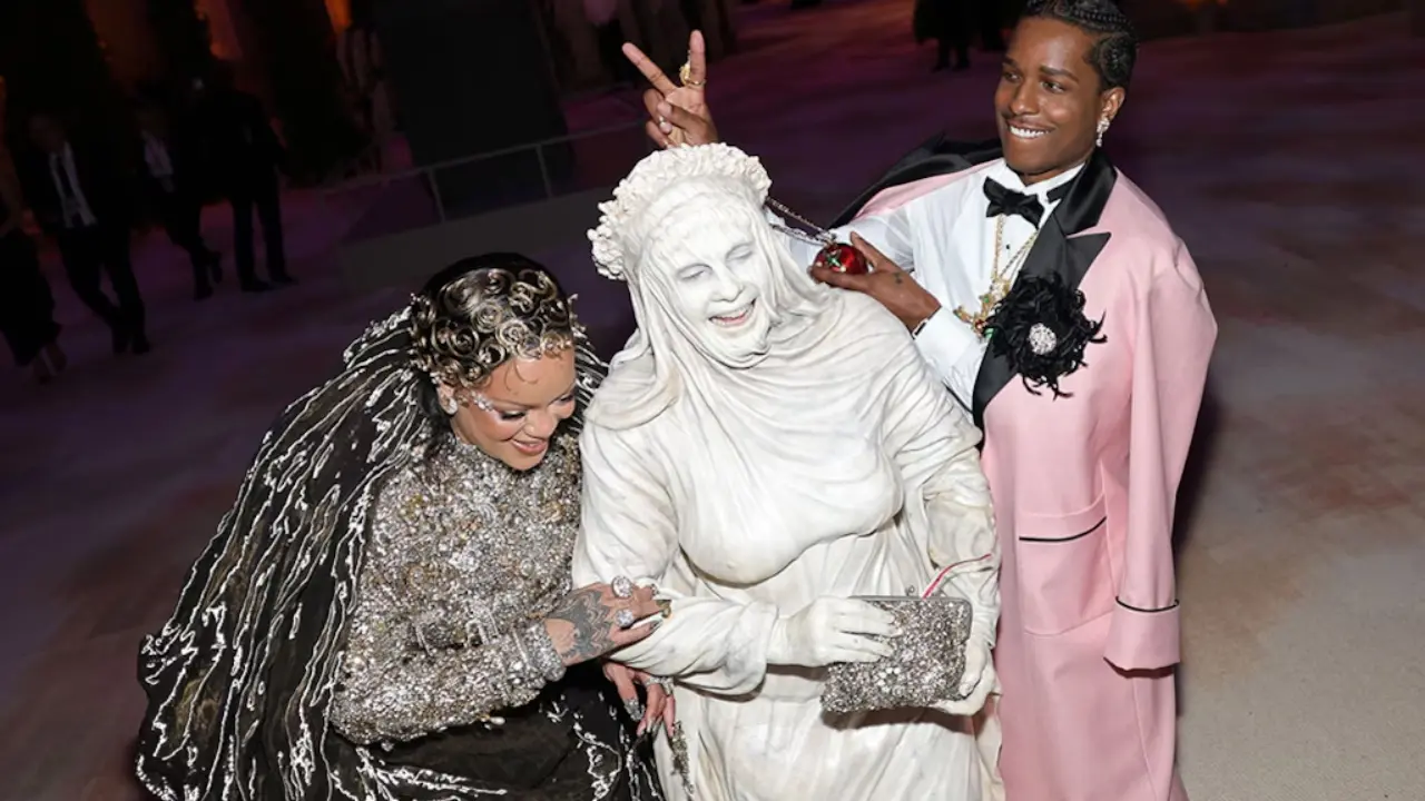 Heidi Klum was dressed as a marble statue, showing off head-to-toe chalky gray body paint. She was seen sharing a fun moment with Rihanna and ASAP Rocky.