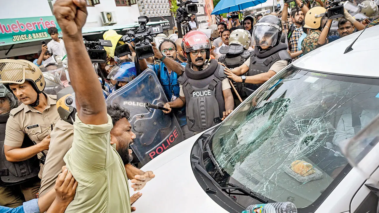 Eight arrested, 300 booked over attack on ED officials in Kerala LDF activists vandalise the vehicle carrying ED officials. Pic/PTI
