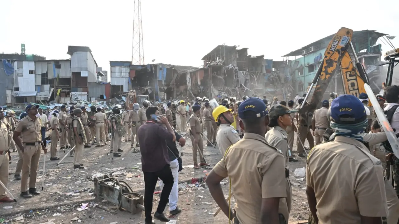 Videos from the spot showed a large number of police officials deputed at the site, with some guarding the demolition area and many others dispersing the crowd Videos from the spot showed a large number of police officials deputed at the site, with some guarding the demolition area and many others dispersing the crowd