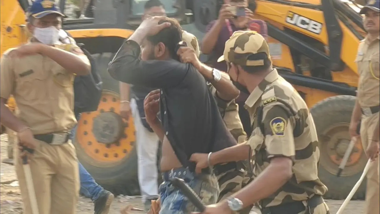 A senior Mumbai Police official said, "Some anti social elements tried to obstruct the work by stone pelting on demolition squad. Police used appropriate force to disperse the anti social elements. Process of registration of FIR is going on. Stern legal action will be taken against these individuals" A senior Mumbai Police official said, "Some anti social elements tried to obstruct the work by stone pelting on demolition squad. Police used appropriate force to disperse the anti social elements. Process of registration of FIR is going on. Stern legal action will be taken against these individuals"