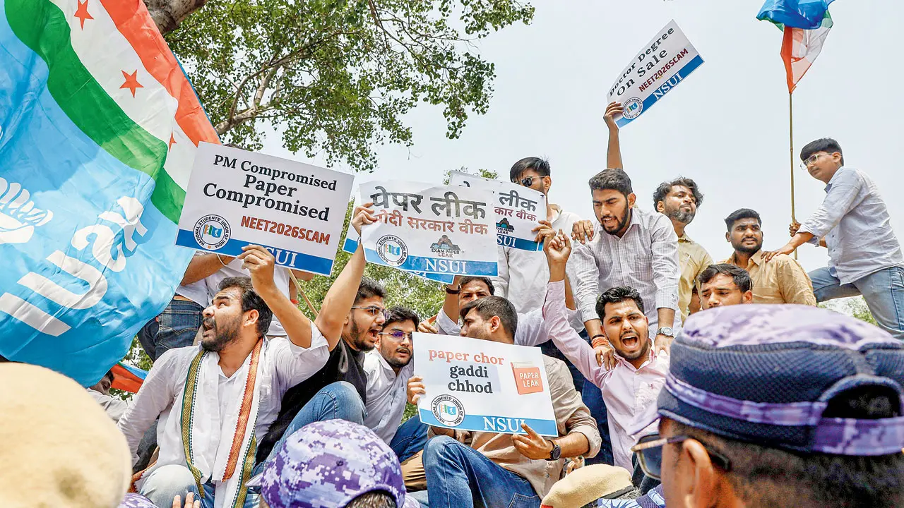 NEET paper leak was ‘very traumatic’, accountability is essential: Supreme Court A Students’ body stage protest over NEET 2026 paper leak earlier this month. File pic/PTI