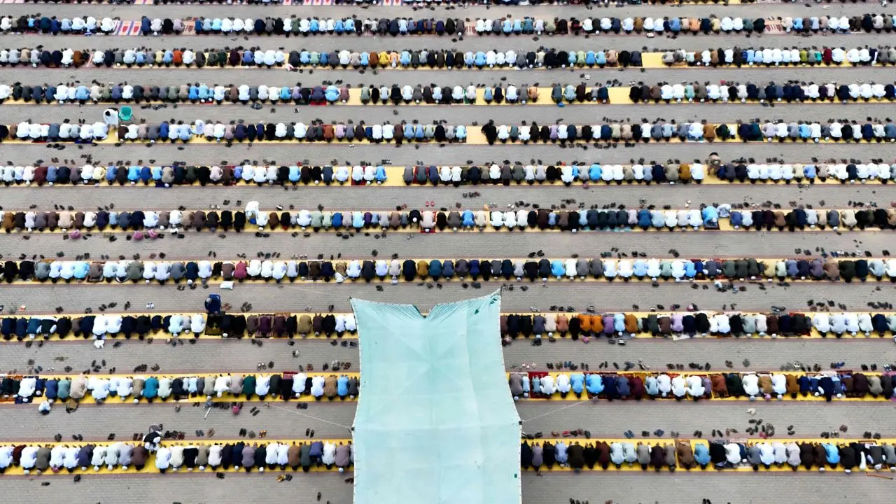 Pakistani devotees offer morning prayers Pakistani devotees offer morning prayers