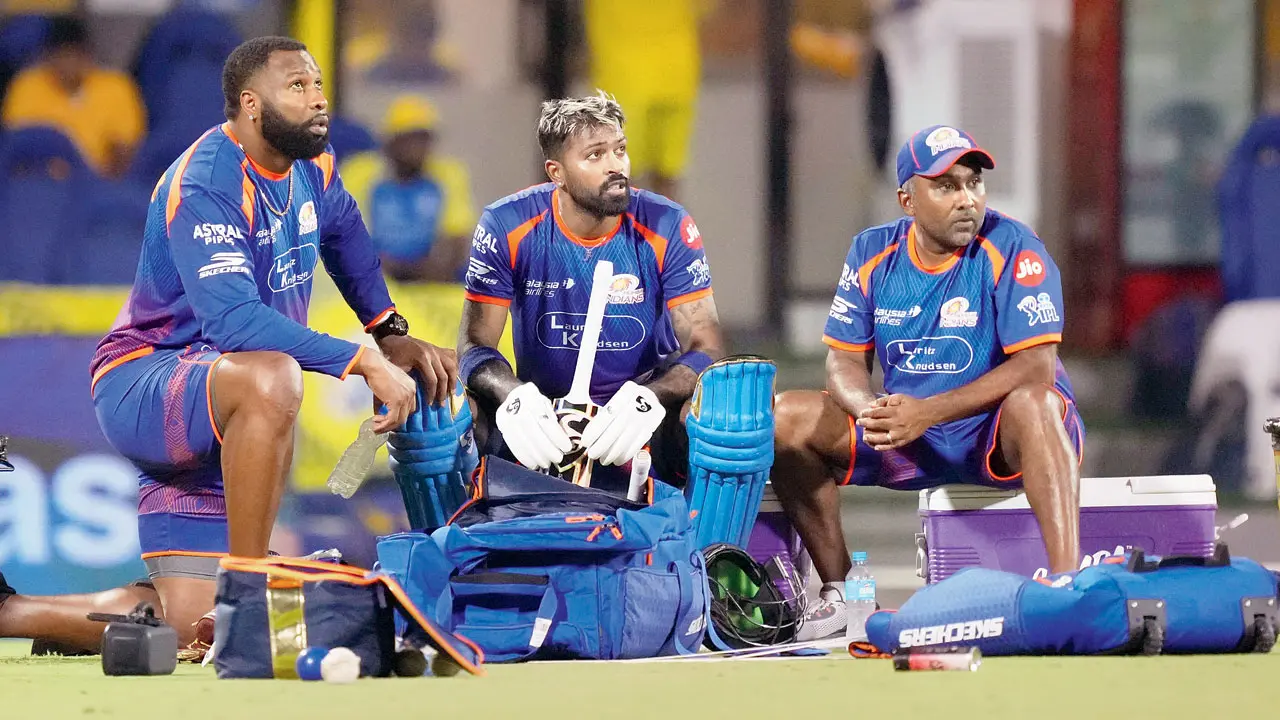 MI skipper Hardik Pandya (centre) with head coach Mahela Jayawardene (right) and batting coach Kieron Pollard during the team’s training session in Chennai on Friday. Pic/PTI