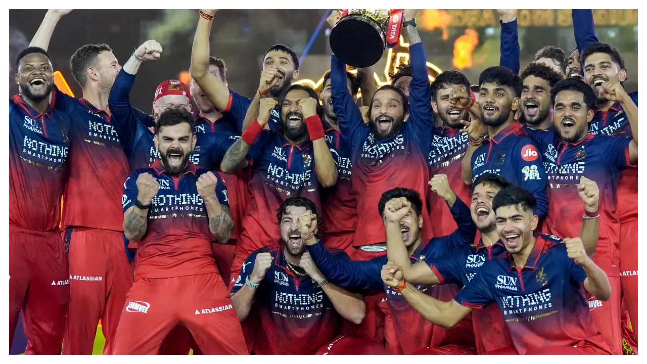 The Royal Challengers Bengaluru will aim to become the first team ever to win three titles in a row when they take the field in IPL 2027. (Pic: PTI)