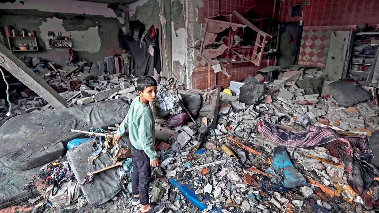 US Defence Secretary Pete Hegseth makes unannounced Israel visit for talks with Netanyahu A boy inspects the damage following an Israeli strike that killed two people in Gaza City, on Tuesday. Pic/AFP