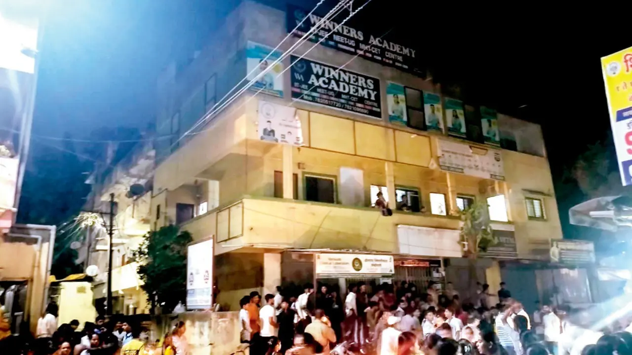 Eight Pune students drown while swimming at Diveagar beach during educational trip Parents gather outside Winners Coaching Institute in Alandi following the Diveagar tragedy. Pic/By Special Arrangement