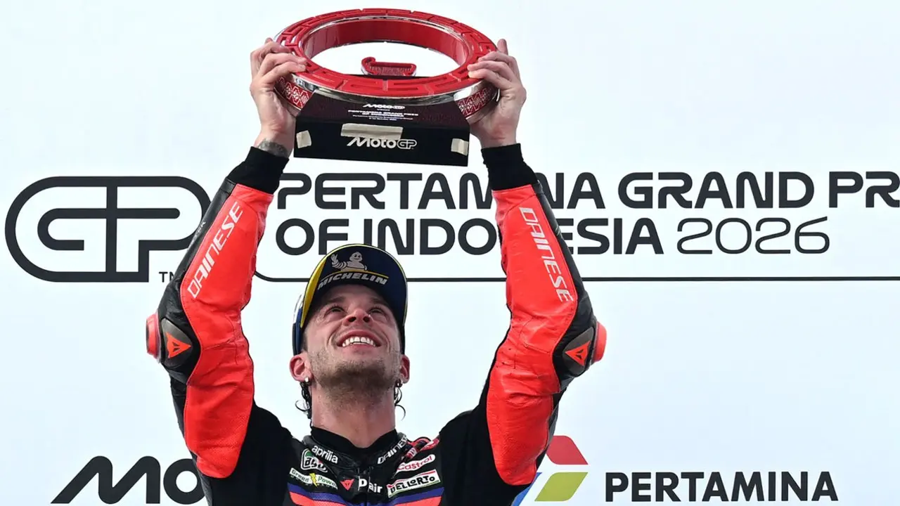 Aprilia Racing Italian rider Marco Bezzecchi celebrates on the podium after winning the MotoGP Indonesian Grand Prix at the Mandalika International Circuit in Mandalika. Pic/AFP
