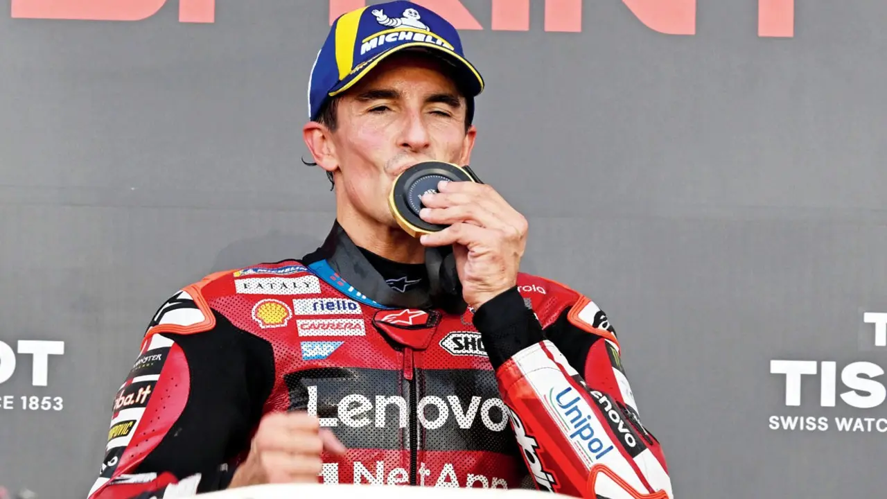Marc Marquez wins Indonesia sprint Marc Marquez kisses his winner’s medal on Saturday. Pic/AFP