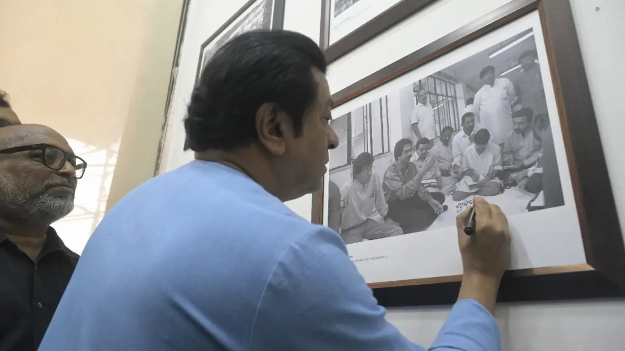 IN PHOTOS: Raj Thackeray inaugurates ‘Dance of Democracy’ exhibition MNS chief Raj Thackeray signs a framed photograph at the Mumbai Press Club on Wednesday, October 21, 2026, after inaugurating veteran photojournalist Gajanan Dhudhalkar’s exhibition “Dance of Democracy”. PIC/ASHISH RAJE