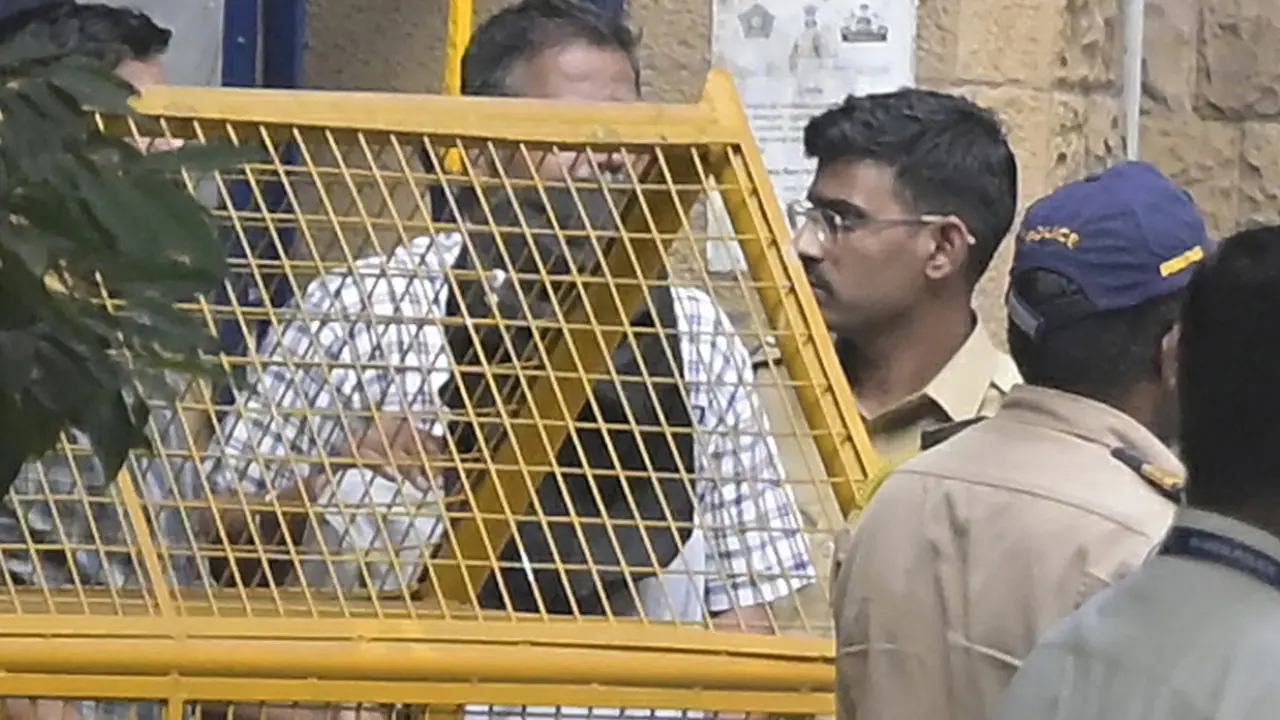 Sold your vehicle? Why you could still face challans and police inquiries The accused with heads covered being brought to Esplanade Court on Wednesday. Pic/Ashish Raje