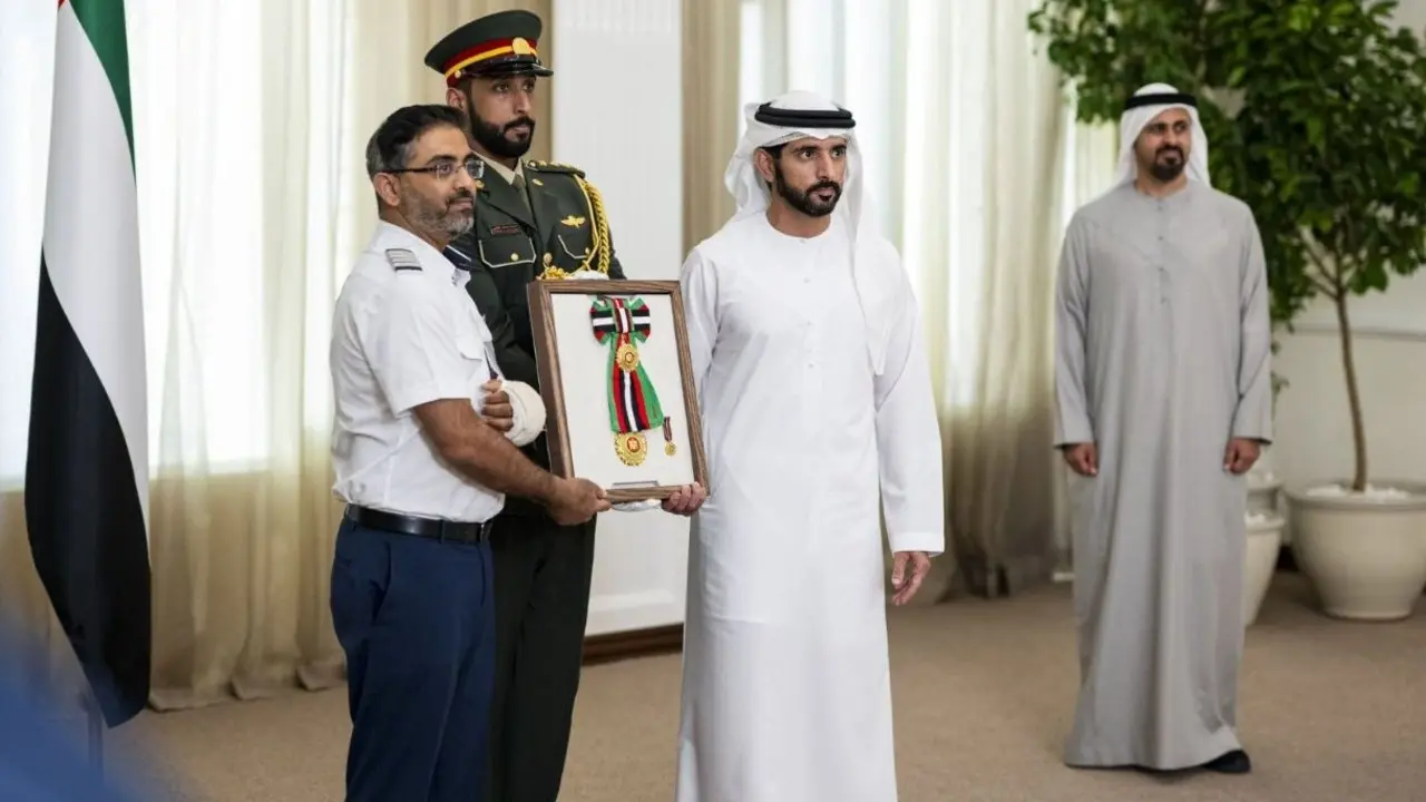 IN PHOTOS: UAE honours Indian pilot Smit Machchhar for courage Deputy PM of the UAE Hamdan bin Mohammed Al Maktoum confers the First Class Order of Zayed II upon the flydubai crew members, including Indian Captain Smit Machchhar, in Dubai. PIC/X