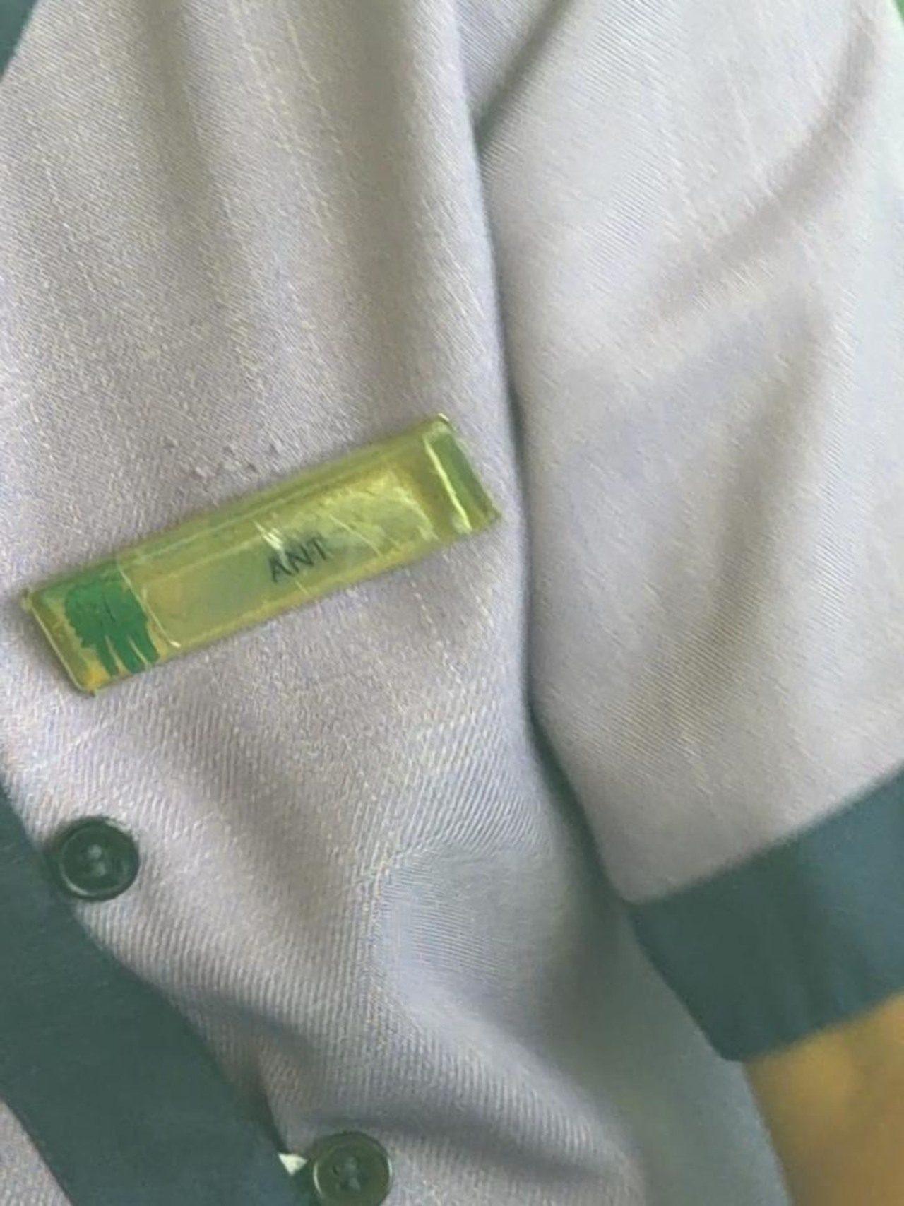 A close-up of a server’s name tag showing his name being "Ant" adds to the fun element of the trip A close-up of a server’s name tag showing his name being "Ant" adds to the fun element of the trip