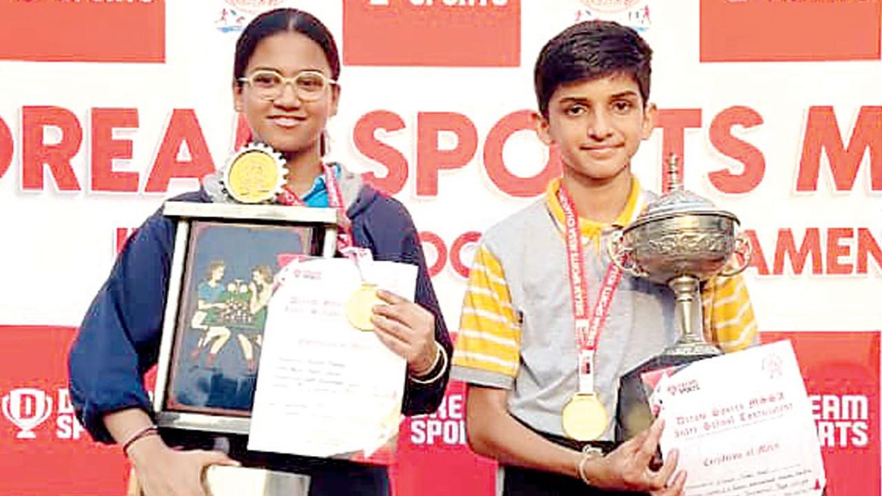 Prisha Margaj and Hitansh Kunal Gohil with their winner’s trophies
