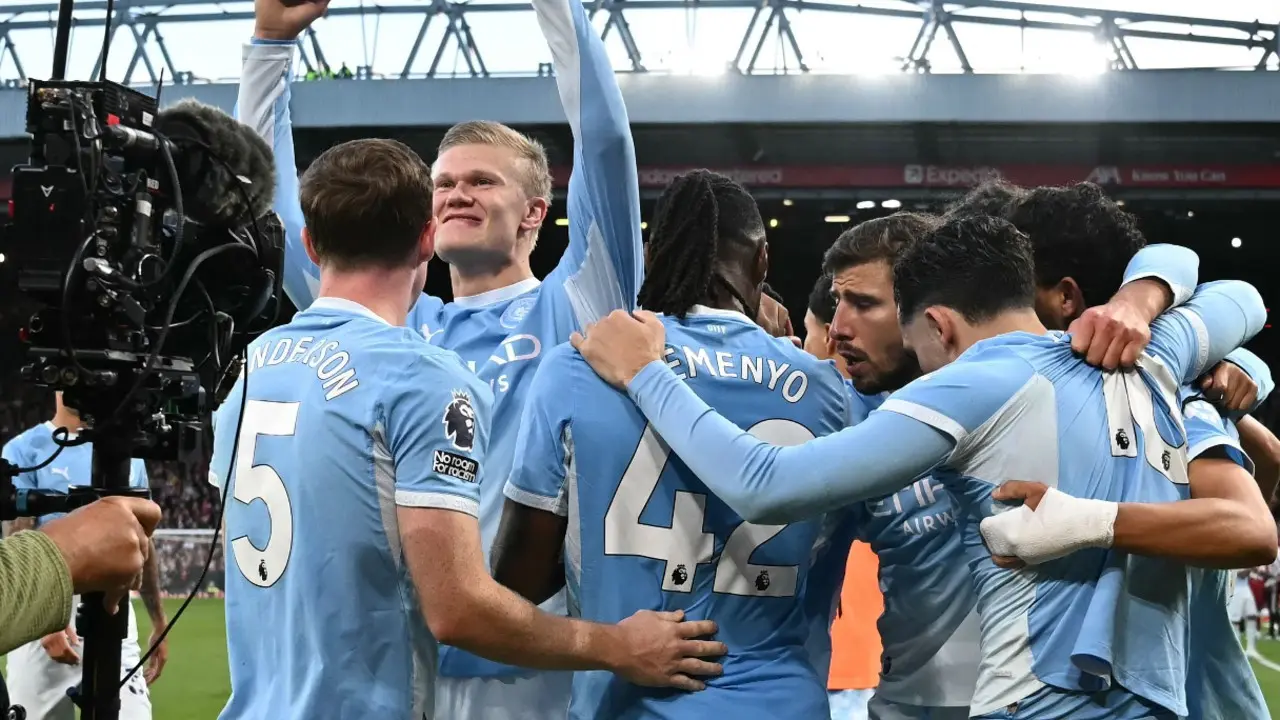 In Photos: Manchester City beat Liverpool 3-0 at a hostile Anfield Manchester City players celebrating the win (Pic: AFP)