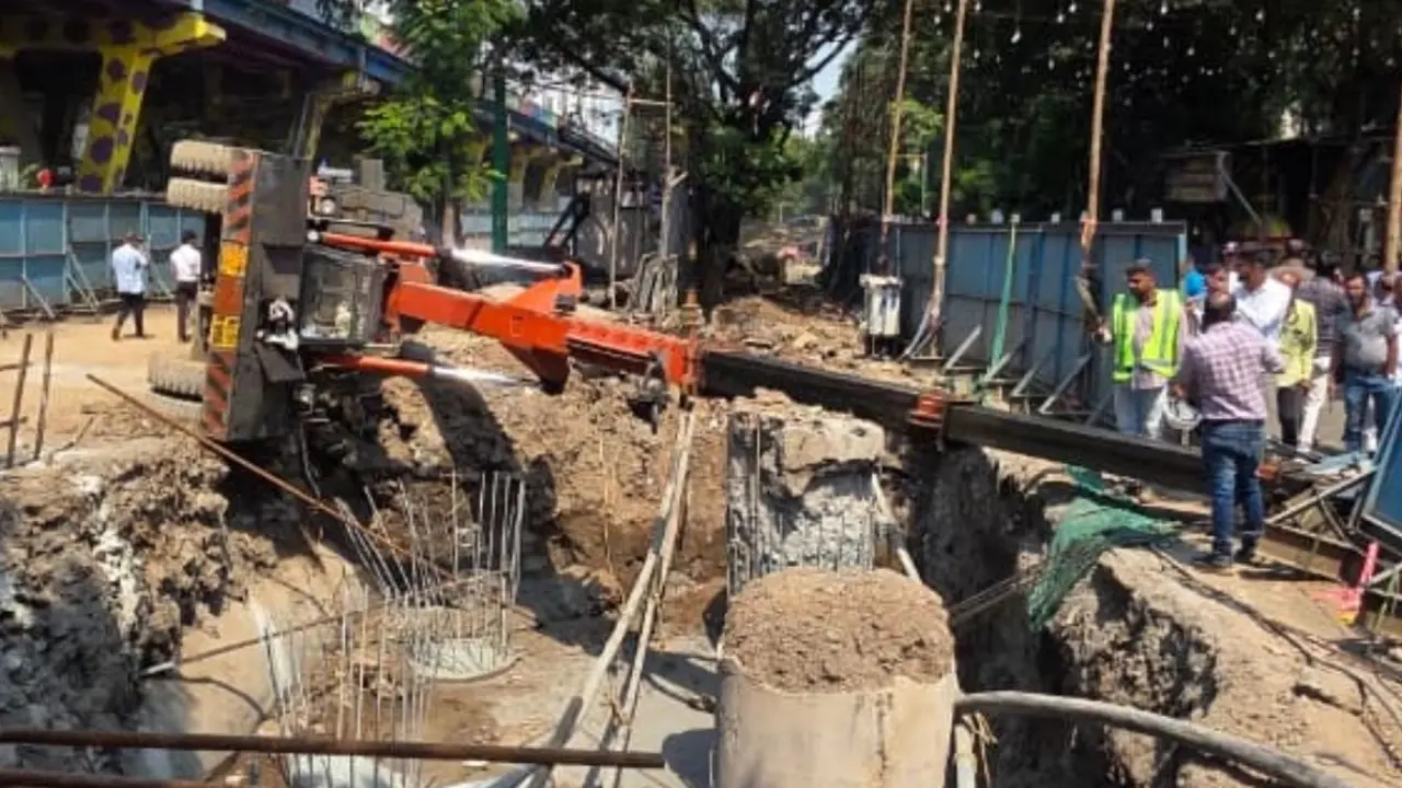 One injured after hydraulic crane tilts at MMRDA elevated road construction site in Thane The incident damaged the auto-rickshaw. Pic/Special Arrangement