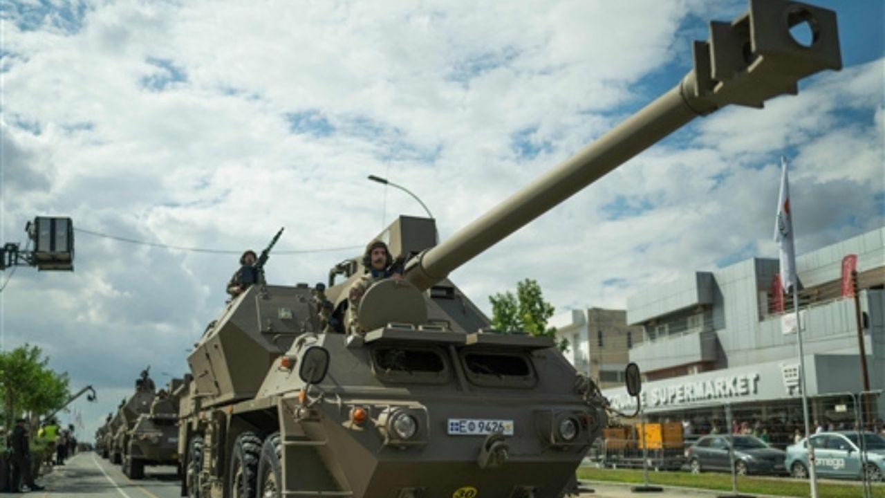 Cypriot soldiers aboard a self-propelled howitzer during the parade