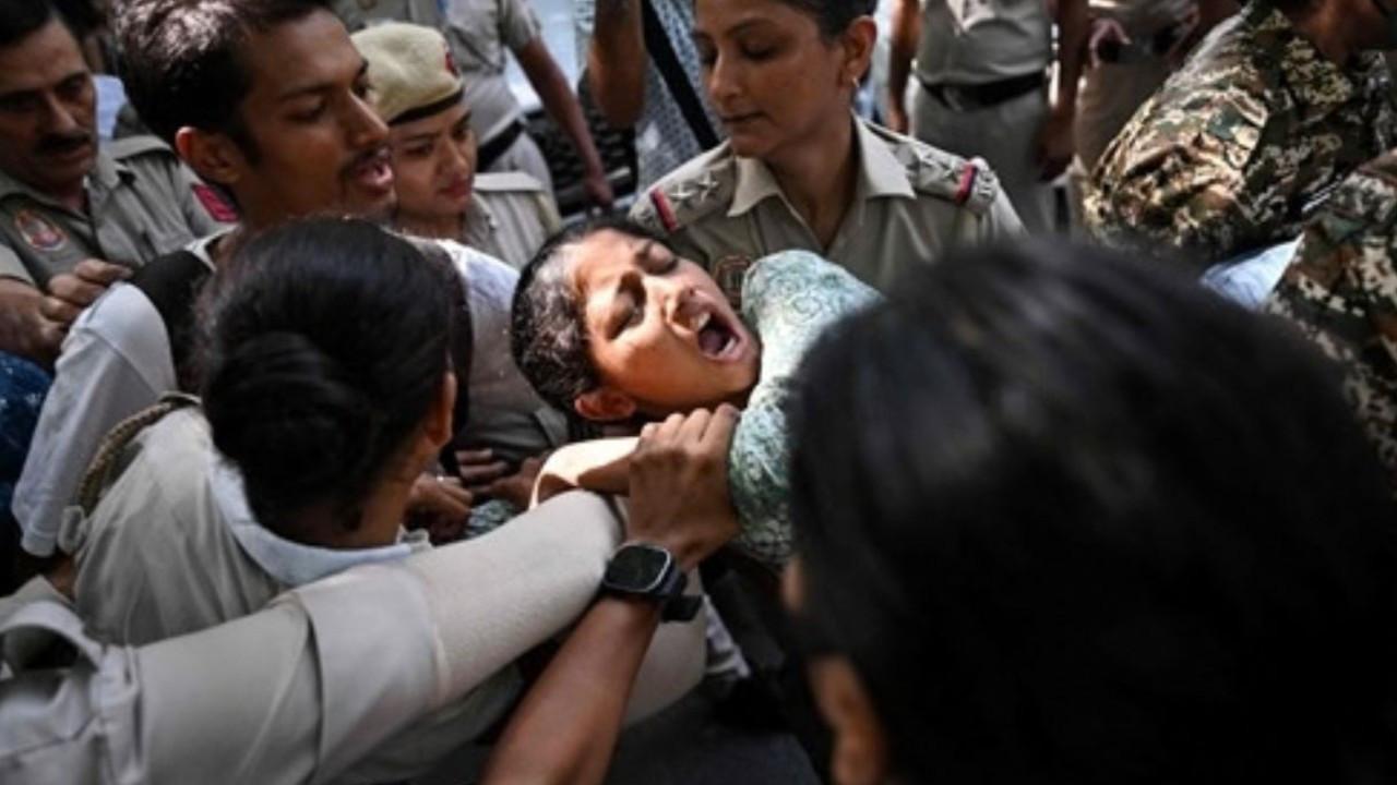 Delhi: Congress demands action after women journalists allege police harassment Police and security personnel detain a protester during a demonstration against India's Chief Election Commissioner Gyanesh Kumar in New Delhi on October 3, 2026. PIC/AFP