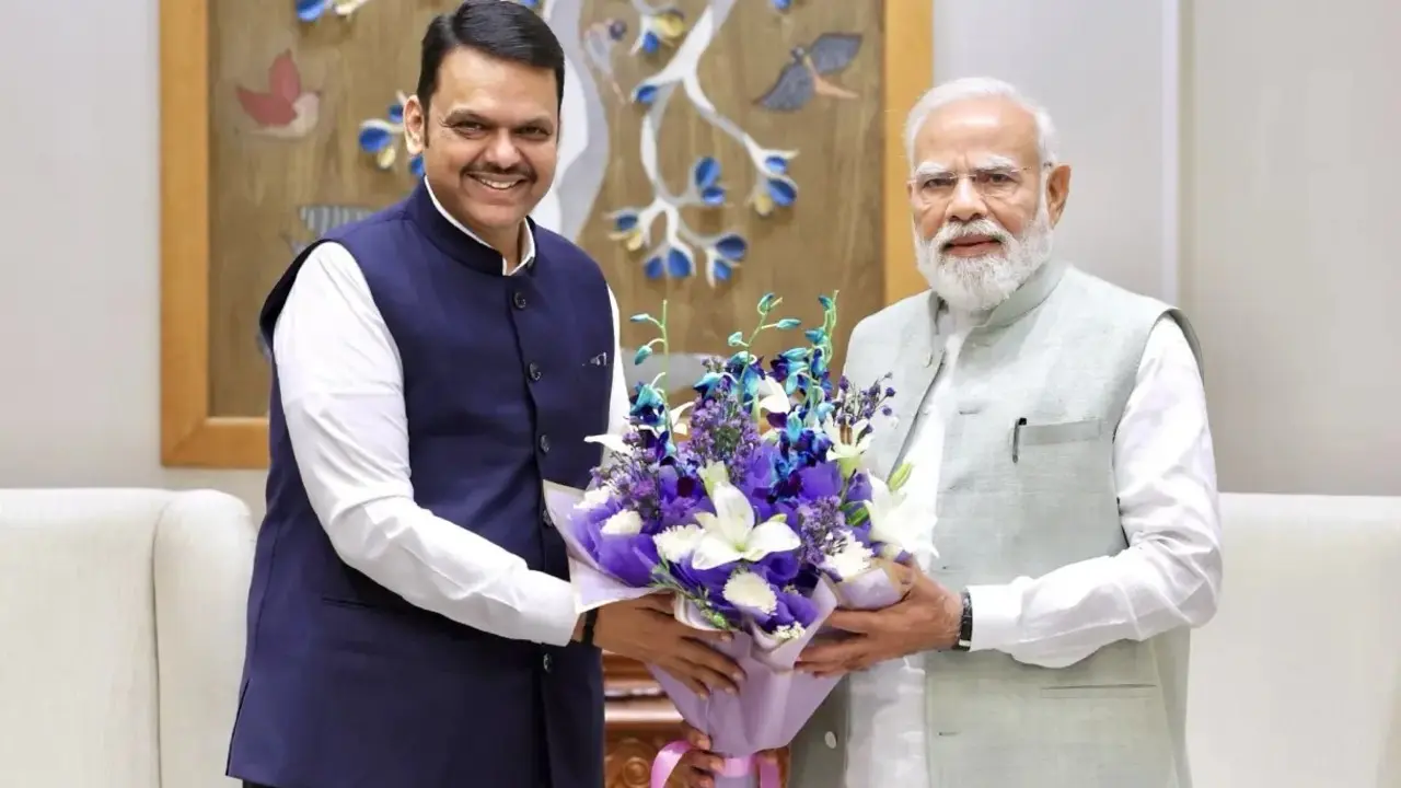 Maharashtra CM Fadnavis hails PM Modi’s 25 years as leader, highlights development and welfare under his leadership PM Narendra Modi and Maharashtra CM Devendra Fadnavis during a previous official engagement. File pic