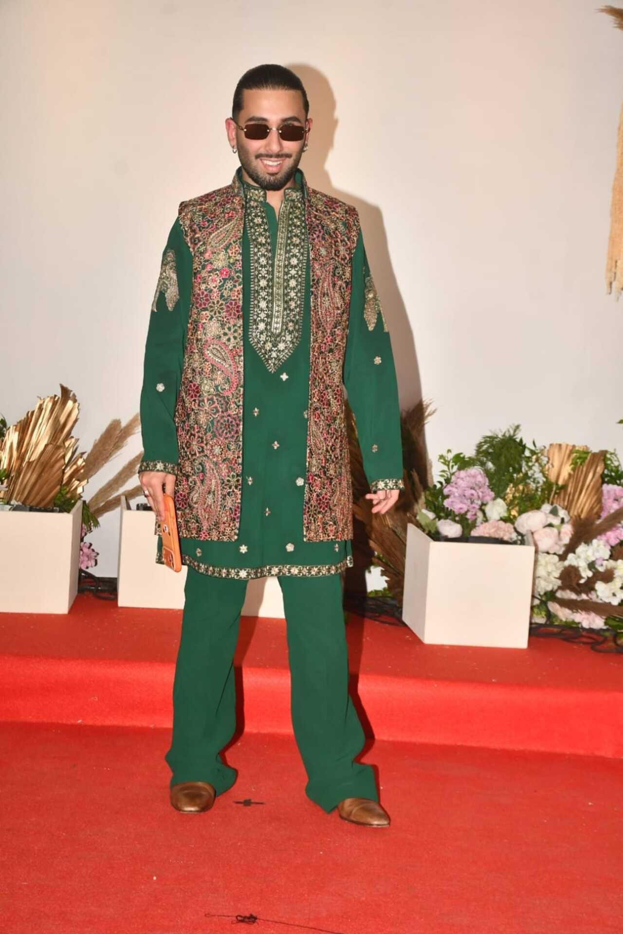 Orry was seen dressed in a green festive kurta with matching pants and a floral wasit coat.